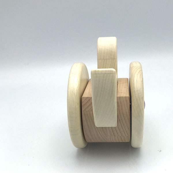 Wooden toy with two wheels on a white background