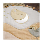Baby bib and blanket set with fox design on a wooden surface
