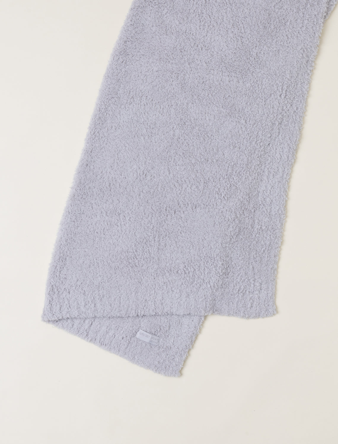 Light blue towel on a white background