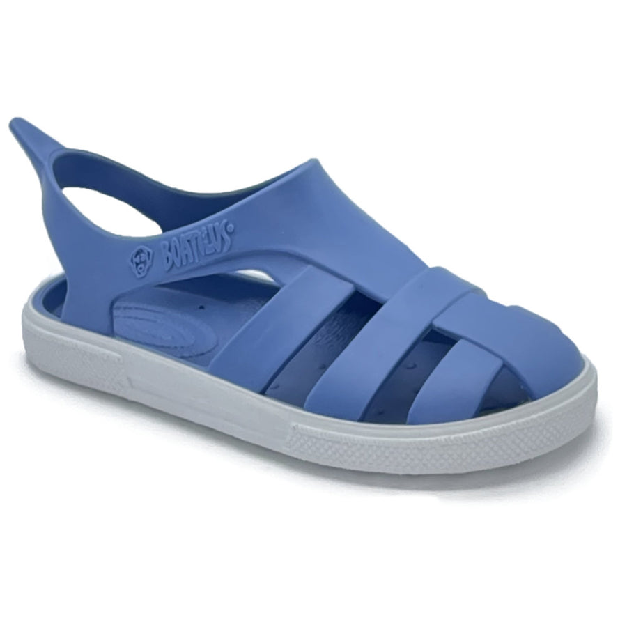 Blue sandal with a white sole on a white background