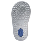 Close-up of a shoe sole with tread pattern and brand logo on a white background