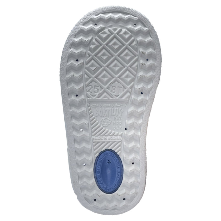 Close-up of a shoe sole with tread pattern and brand logo on a white background