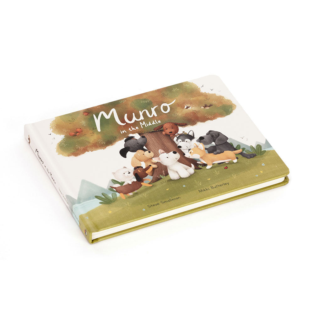 Children's book titled 'Munro in the Middle' with illustrations of animals on a white background