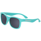 Turquoise sunglasses with dark lenses on a white background