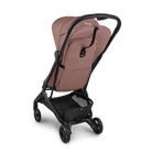 Brown stroller with black frame on a white background