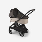 Baby stroller with canopy on a white background