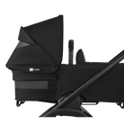 Black baby stroller with canopy on a white background