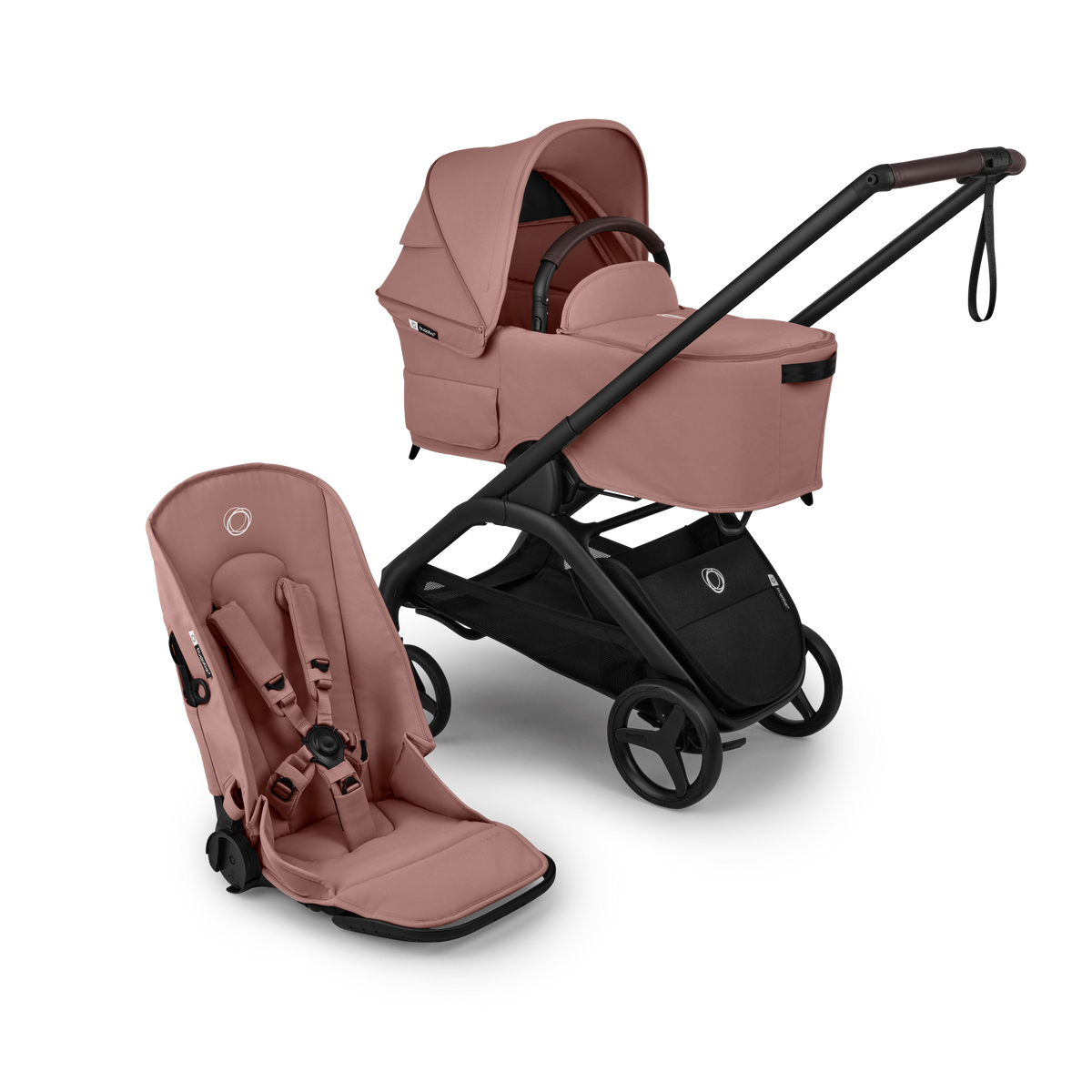 A stroller and bassinet travel system in dusty rose pink with a black frame and wheels, shown on a clean white background. The bassinet is attached to the stroller, and a matching infant car seat is positioned separately in front.