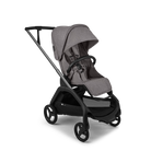 Beige baby stroller with black frame on a white background