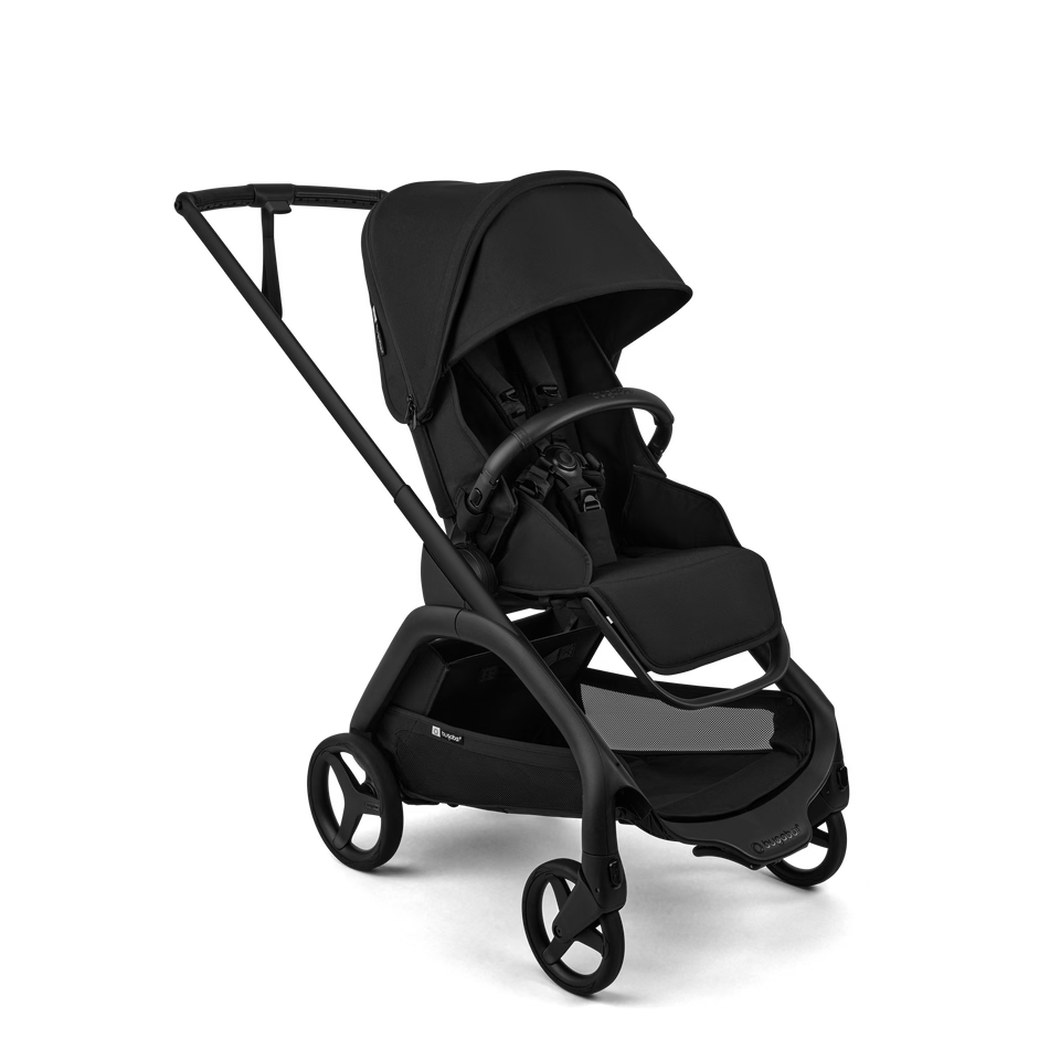 A black Yupoong stroller with a matching black canopy and frame, shown from a three-quarters angle on a clean white background.