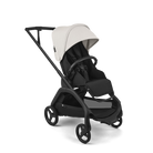 A modern stroller with a black frame and seat, featuring a light beige canopy and black wheels, shown on a clean white background.