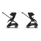 Two black baby strollers on a white background