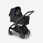 Black stroller on a white background