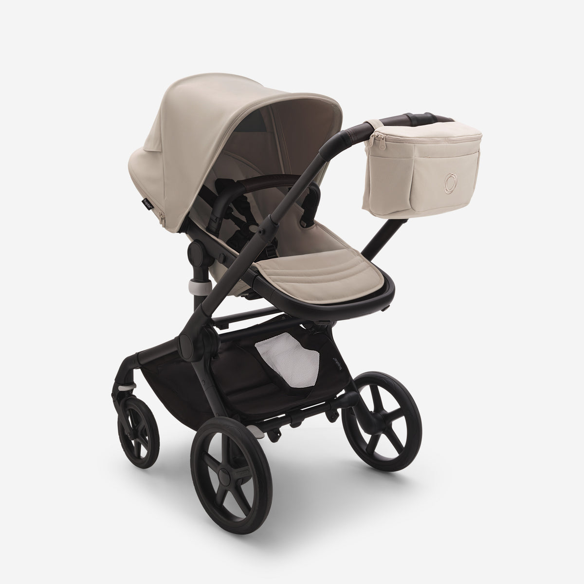 Beige and black stroller with a cup holder on a white background