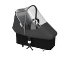 Black baby stroller with transparent rain cover on a white background