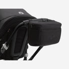 Black stroller with a storage bag attached on a white background