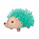 Toy hedgehog with green spines on a white background