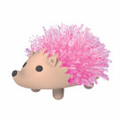 Toy hedgehog with pink spines on a white background