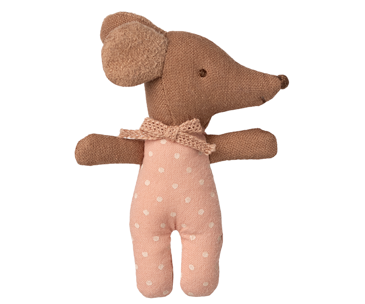 Stuffed toy mouse with a bow tie on a white background