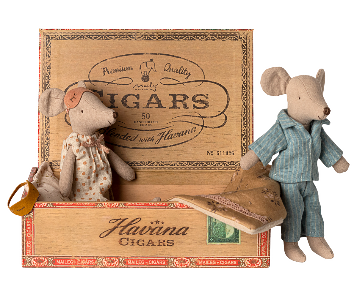 Maileg Mum mouse resting inside a vintage cigar box while Dad mouse stands outside next to it.