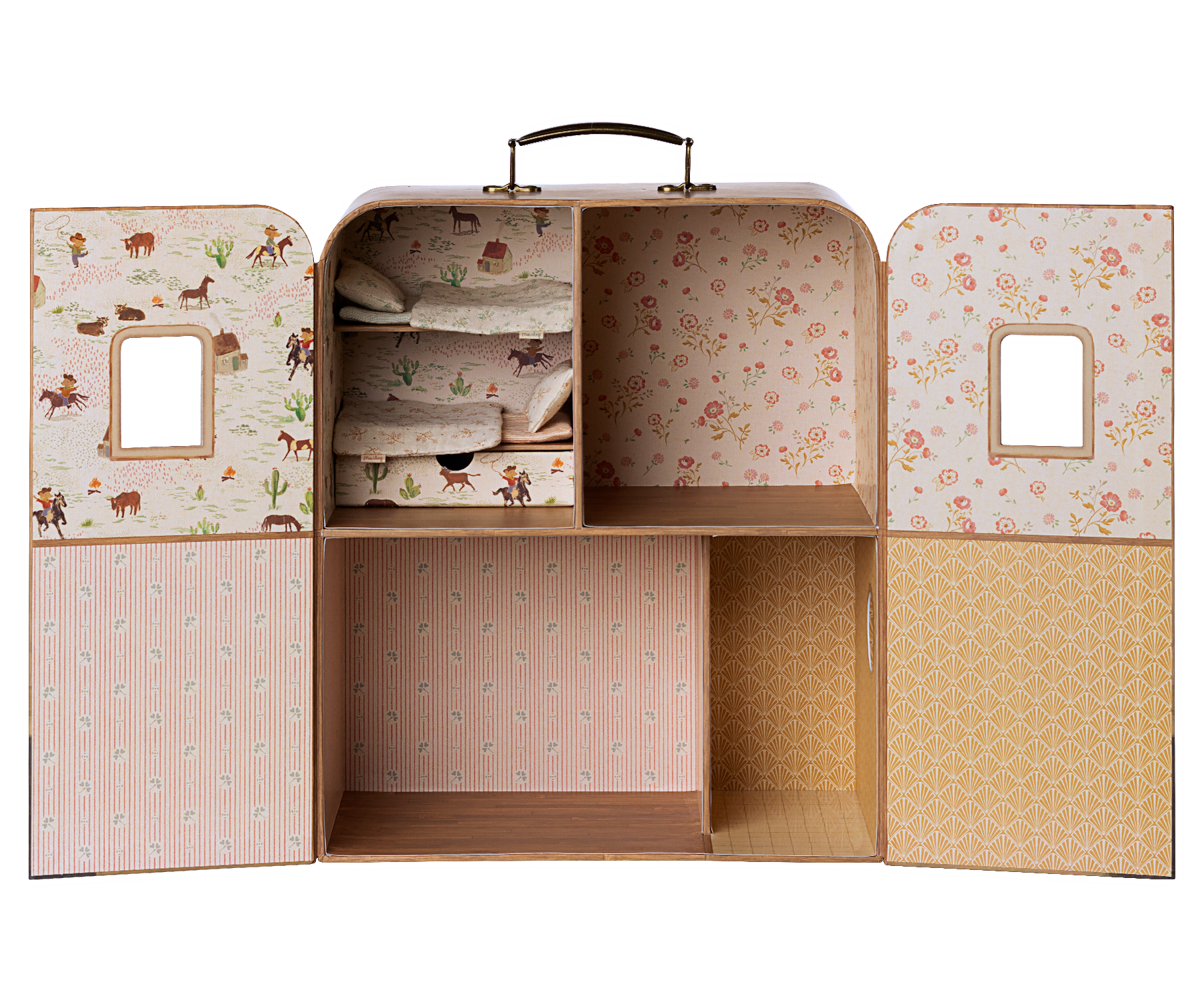 Children's toy chest with patterned doors on a white background