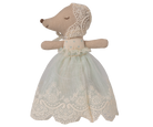 Stuffed animal toy with a lace dress on a white background