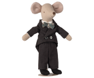 Stuffed toy mouse in a black suit with a bow tie on a white background