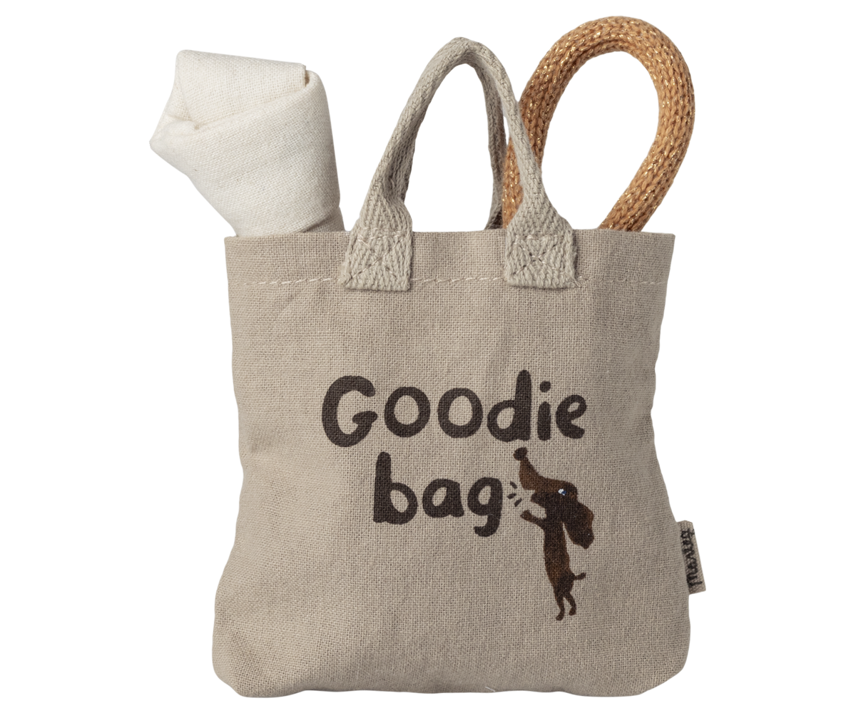 Small beige fabric bag with 'Goodie bag' text and a squirrel illustration on a white background.