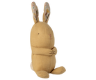 Beige plush bunny toy with patterned ears on a white background