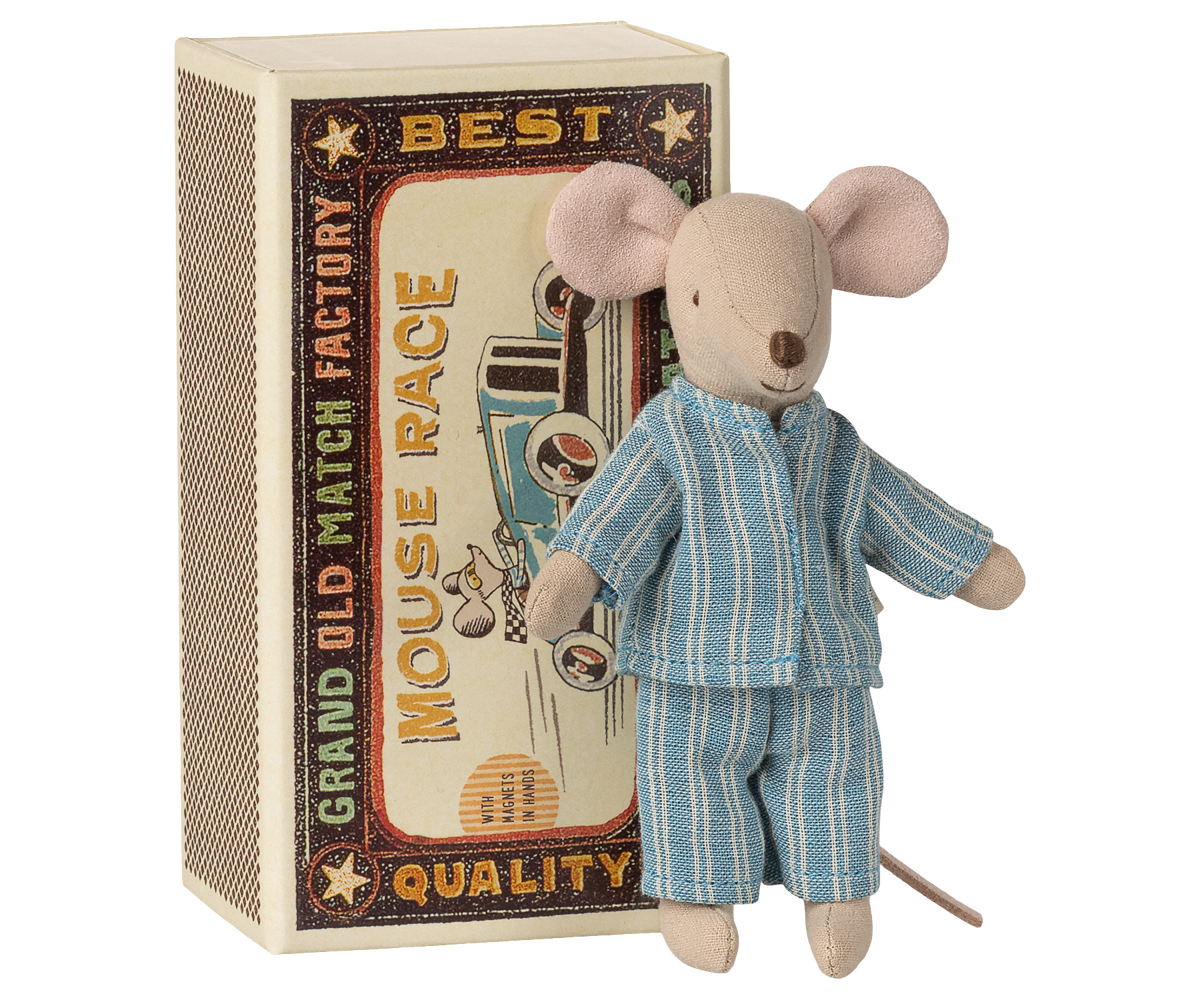 A toy mouse dressed in blue striped pyjamas, standing upright next to an open decorative matchbox labeled "Mouse Race Grand Old Match Factory."