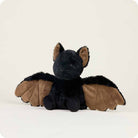 Plush toy dragon with black body and brown wings on a white background