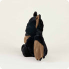 Plush toy bear with black fur and brown paws on a white background