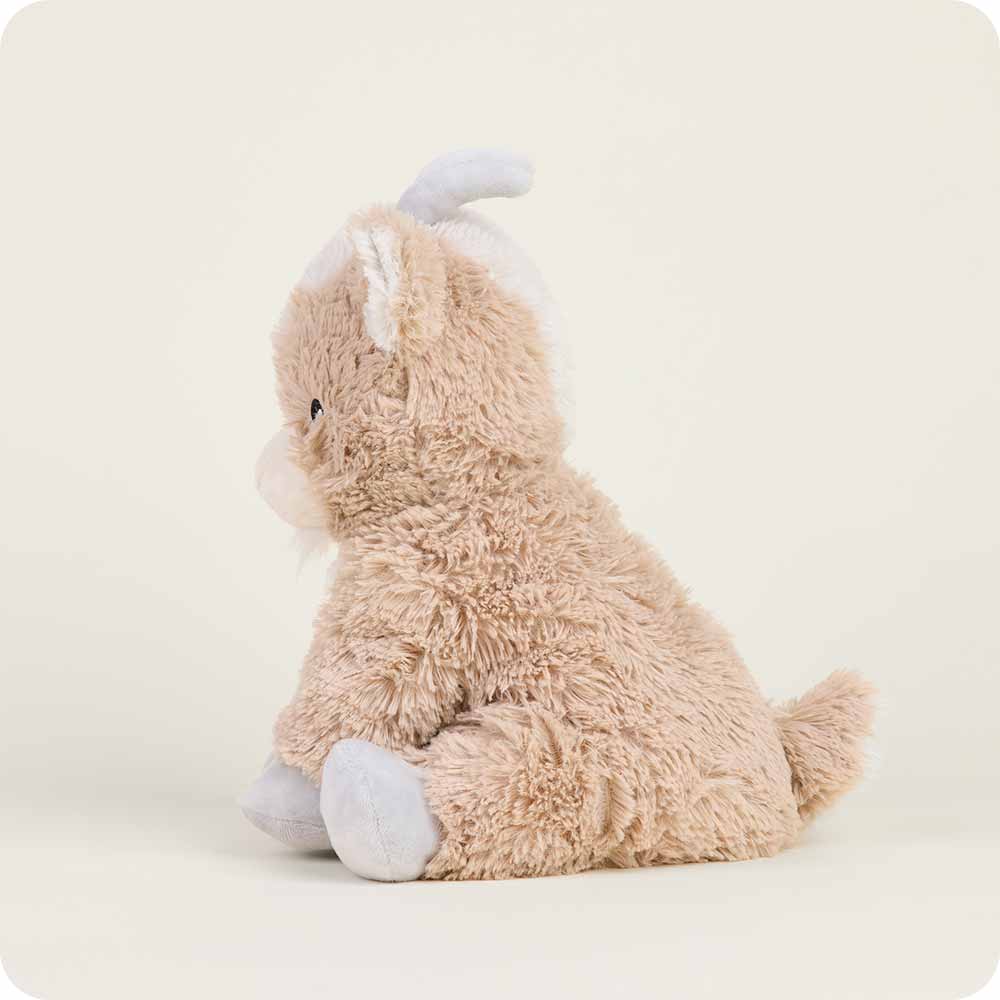 Plush toy elephant on a light gray background
