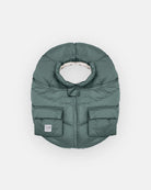 Green puffer baby seat cover on a white background