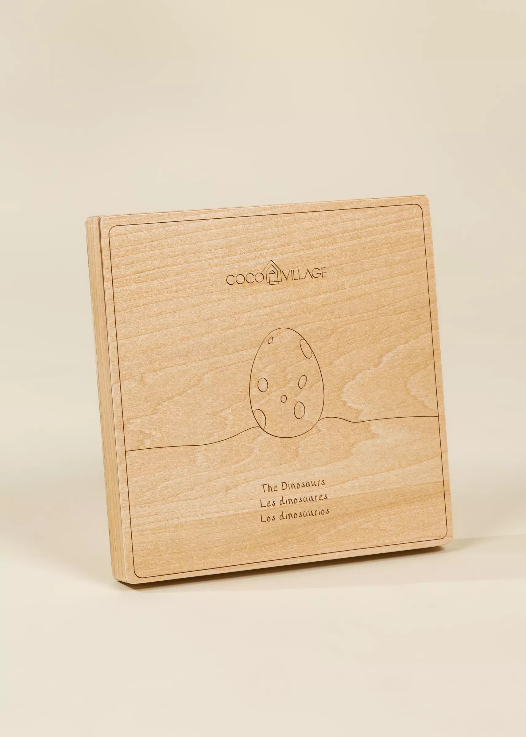 Wooden box with 'Coco Village' branding on a beige background
