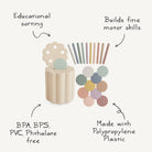 Educational toy set with sorting and building components on a white background
