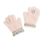 Pair of fuzzy pink gloves with decorative gemstones on a white background