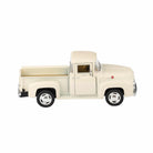 Model of a vintage cream-colored pickup truck on a white background