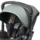 Gray and black baby car seat with visible branding on a white background