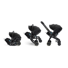 Black baby stroller and car seat set on a white background