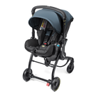 Black and gray stroller with a baby seat on a white background