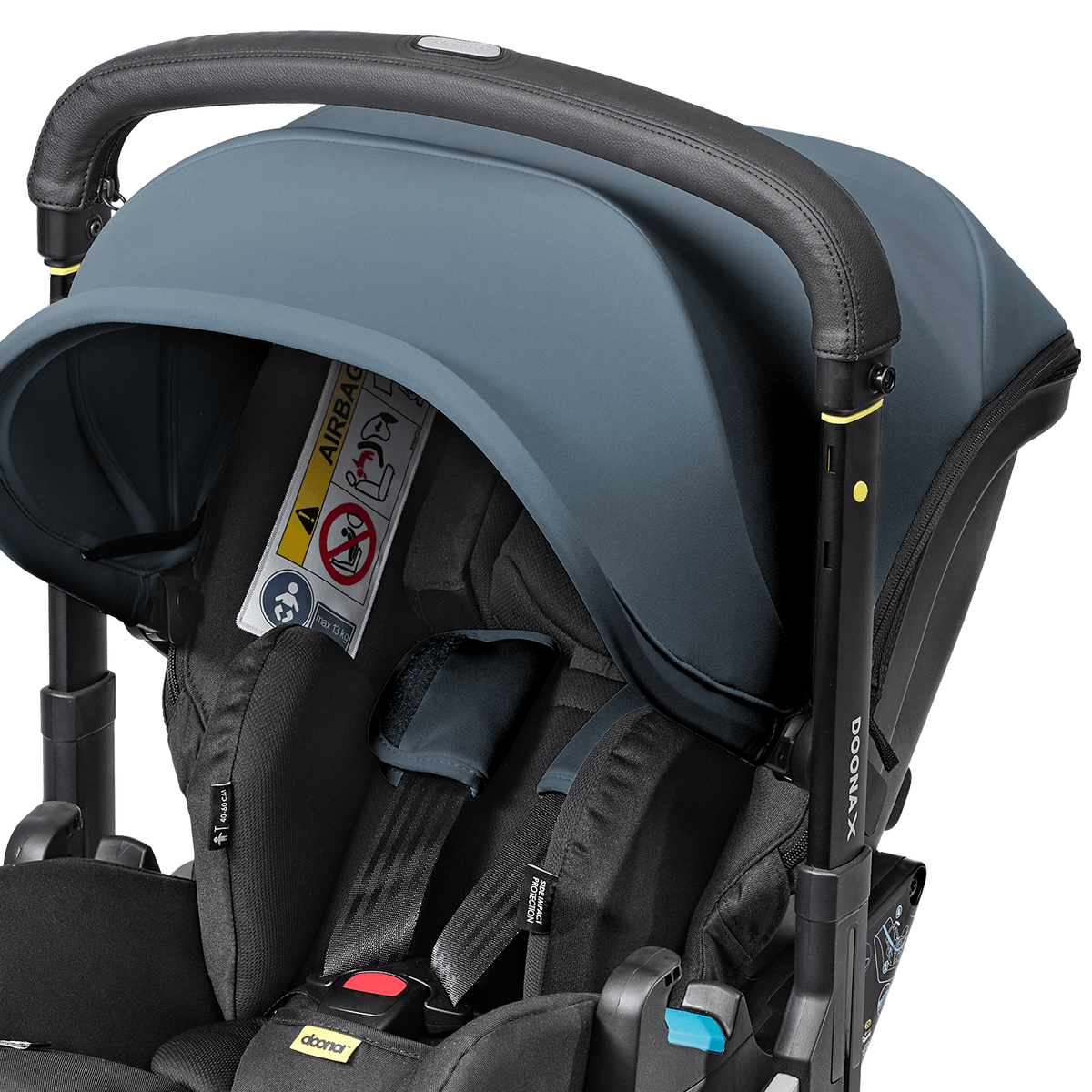 Black and gray stroller with a baby seat on a white background