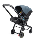 Black and gray stroller with a baby seat on a white background