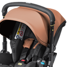 Brown and black baby car seat with canopy on a white background