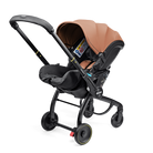 Baby stroller with brown seat cover on a white background