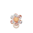 Floral-patterned teething ring on a white background