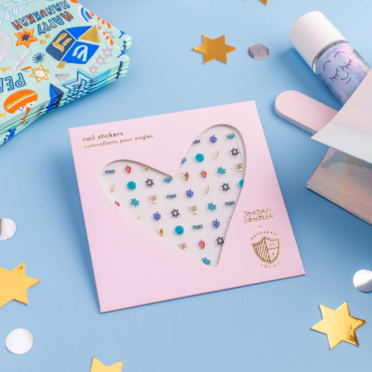 Nail sticker set with packaging on a blue background