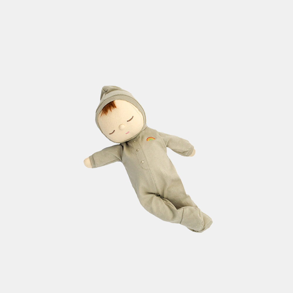 Baby doll in a light gray outfit with a hood on a white background
