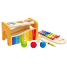 Colorful wooden toy set with various instruments on a white background