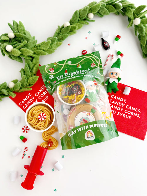 Elf on the Shelf playset with candy-themed packaging and accessories on a white background.